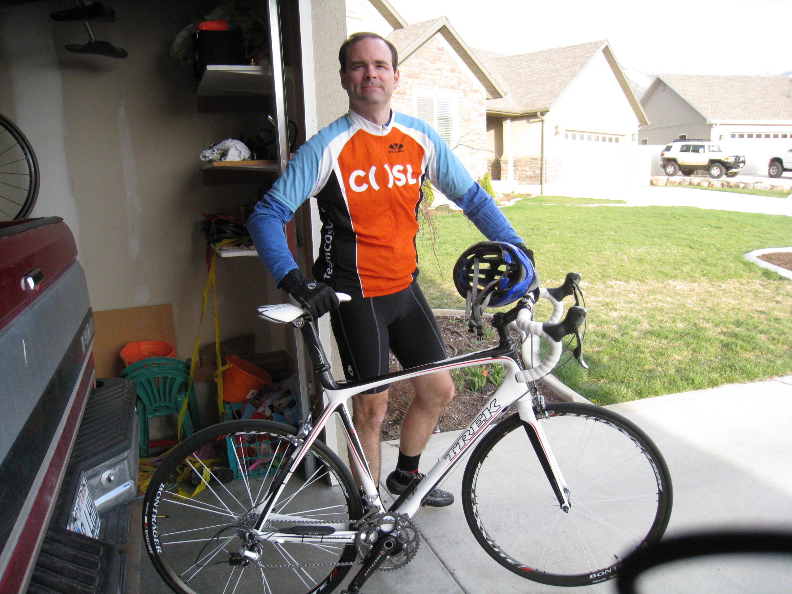 Justin standing by new Madone getting ready for first ride